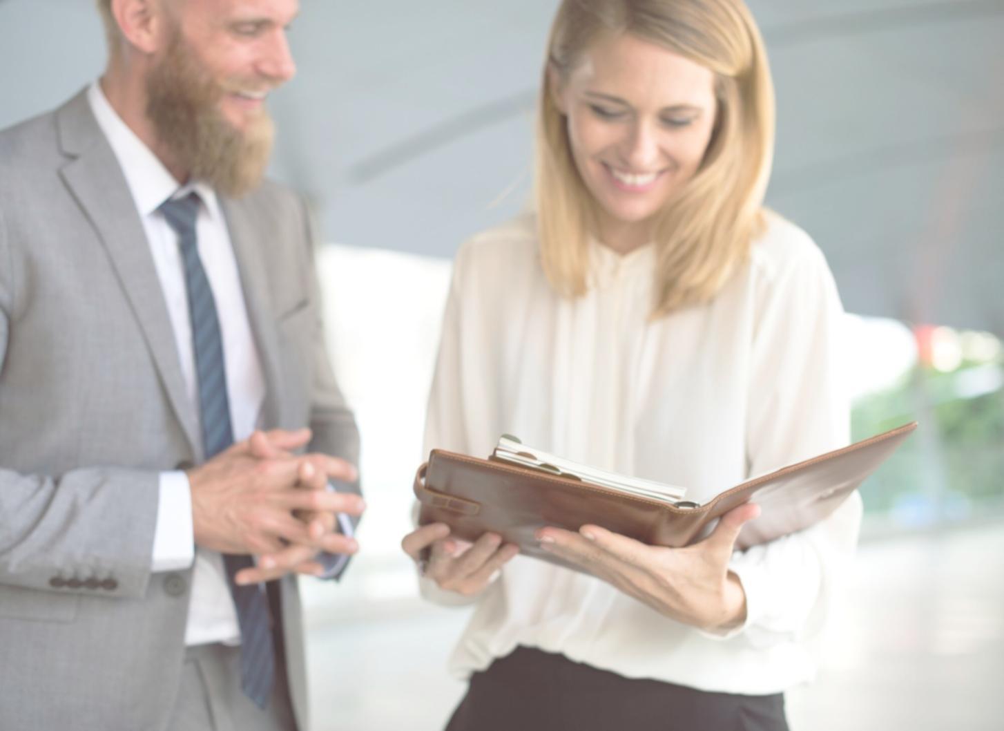 Professional financial workspace with organized documents and planning materials